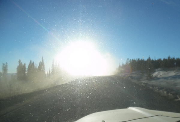 dimming high beam and driving lights. There are also daytime hazards like bright sun glare.