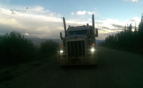 Dimming high beams and driving lights is a serious issue in the oil and gas industry when off road trucking on narrow and dangerous roads.