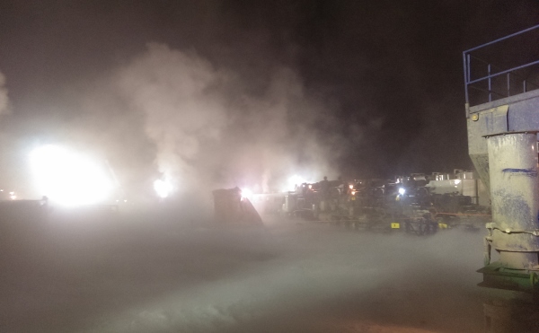 Frac Hauling frac sand dust and vapour clouds