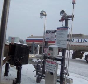 Crude Oil Hauling. Unloading at a riser box.