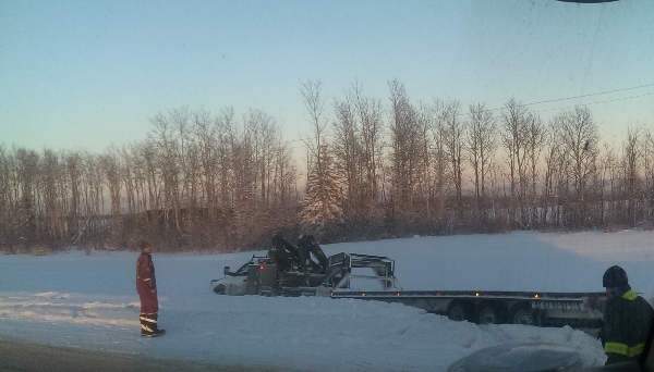 Oilfield Accidents. 1 ton truck and gooseneck trailer in need of a tug