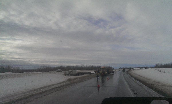 Oilfield Accidents. A set of b-train in the median on Hwy 43 Alberta