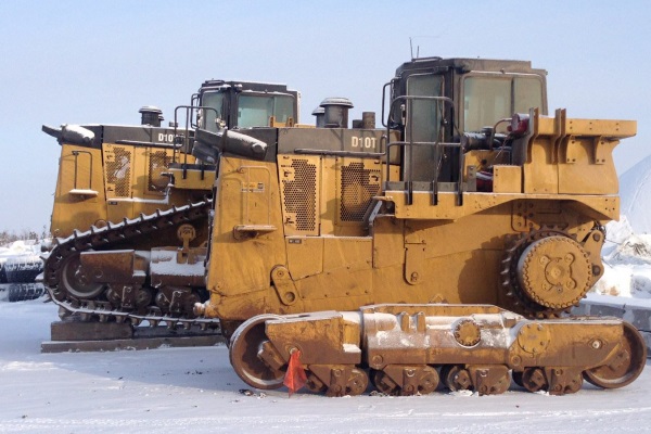 Ice Road Loads. 2 D-10 dozers waiting to travel up the ice road