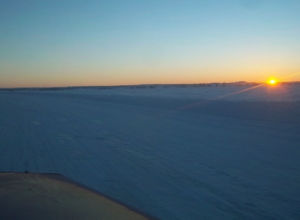 Ice road driving photos. Catching sunsets and sunrises one after another as ice road drivers push themselves to their limits.