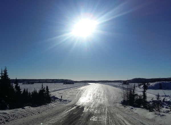 Ice road driving photos. Coming off the bottom of Charlie's hill on the Tibbitt to Contwoyto ice road in Northwest Territories, Canada.