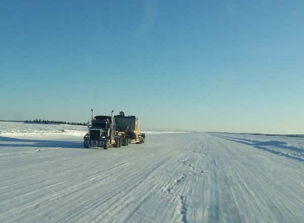 Ice road driving photos. A heavy hauler on the ice roads bringing equipment to the diamond mines.