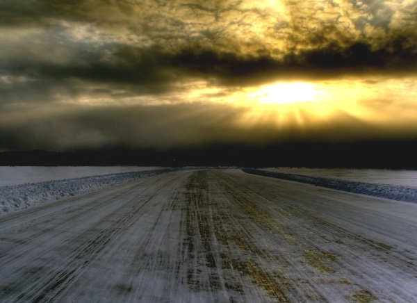 Ice Road Scenery. Dark sunset