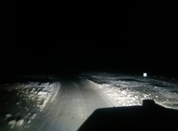Ice road driving photos. Long hours as an ice road trucker mean driving all day and all night.